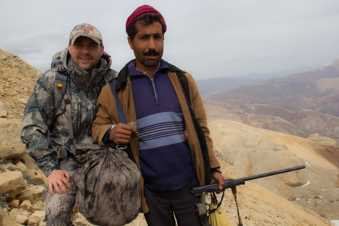 Crew with a local guide on a mountainside shoot